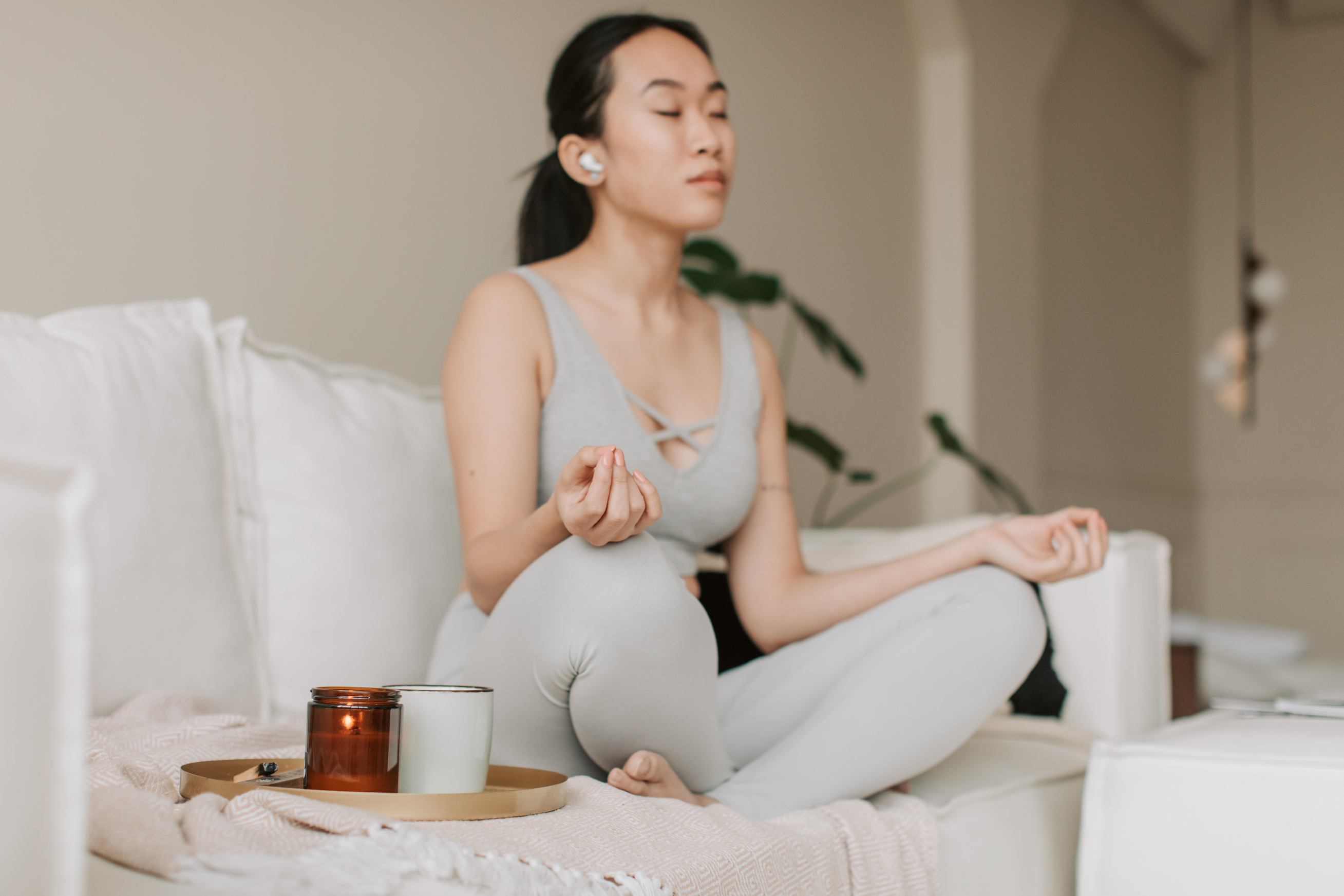 Woman Meditating at Home